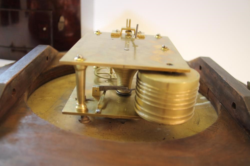 A VICTORIAN WALL CLOCK Image