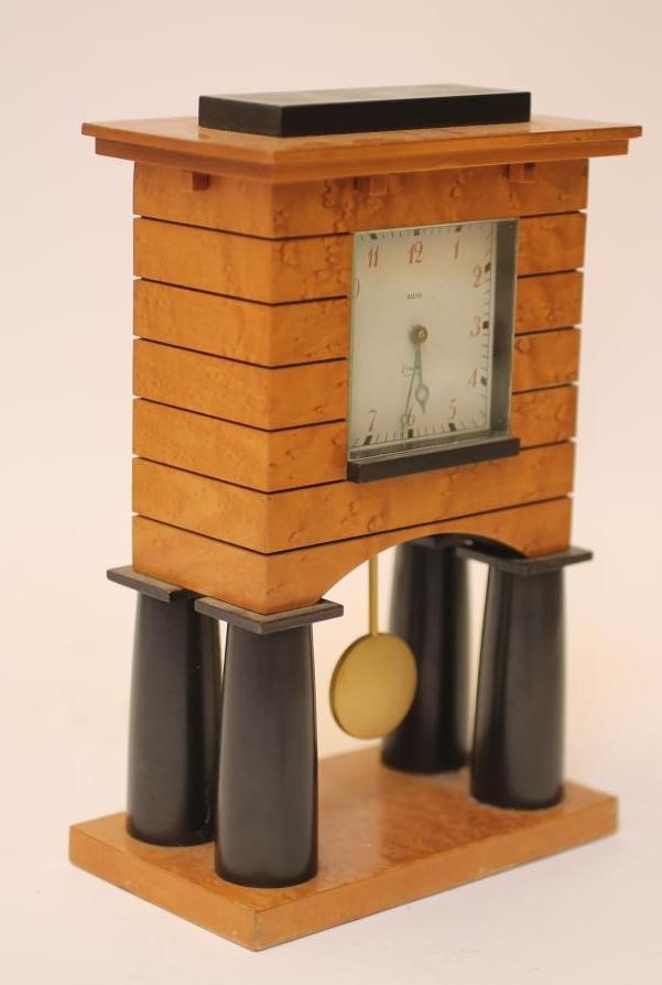 AN ALESSI MANTEL CLOCK designed by Michael Greaves 1986 with battery operated movement Image
