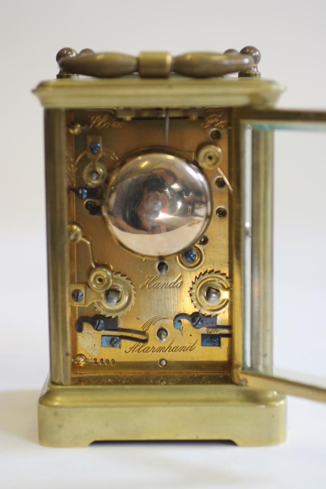 A BRASS CASED REPEATER CARRIAGE CLOCK Image
