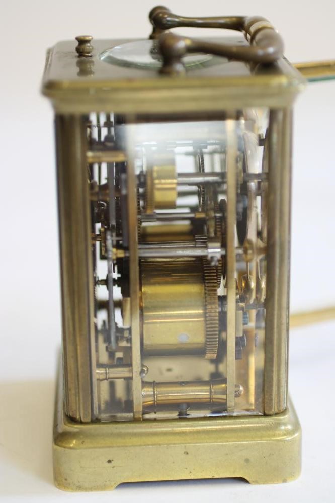 A BRASS CASED REPEATER CARRIAGE CLOCK Image