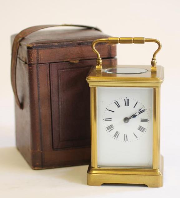 A GILDED BRASS CASED CARRIAGE CLOCK Image