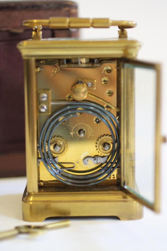 A GILDED BRASS CASED CARRIAGE CLOCK Image