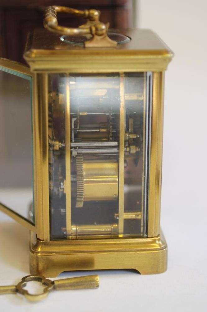 A GILDED BRASS CASED CARRIAGE CLOCK Image