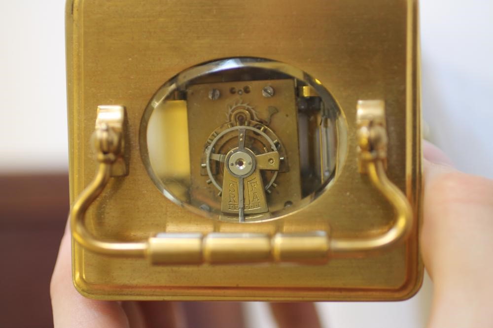 A GILDED BRASS CASED CARRIAGE CLOCK Image
