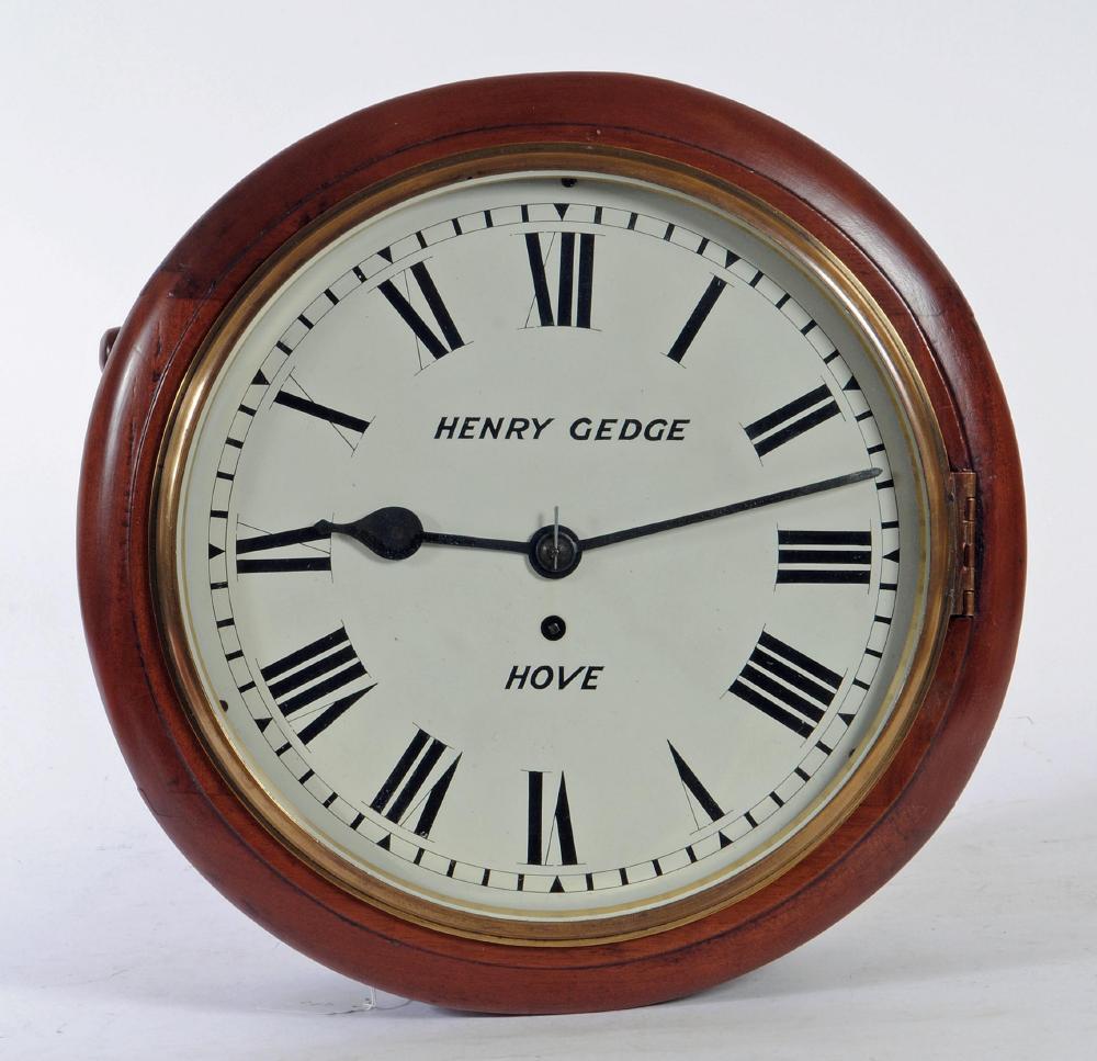 A MAHOGANY WALL CLOCK Image