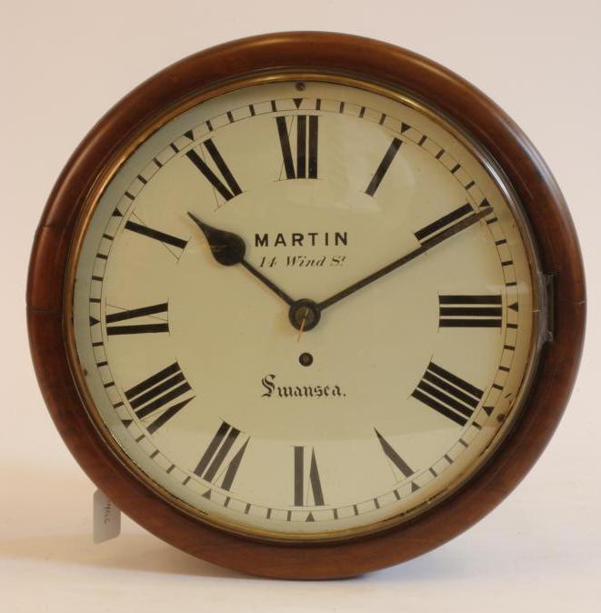 A MAHOGANY WALL CLOCK signed Martin Image
