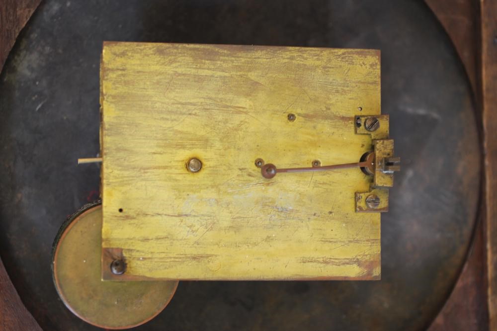 A MAHOGANY WALL CLOCK signed Martin Image