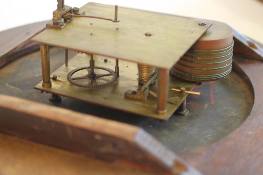 A MAHOGANY WALL CLOCK signed Martin Image