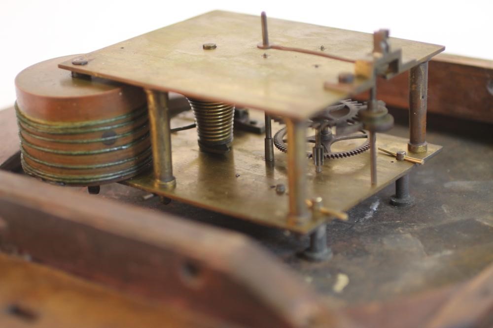 A MAHOGANY WALL CLOCK signed Martin Image