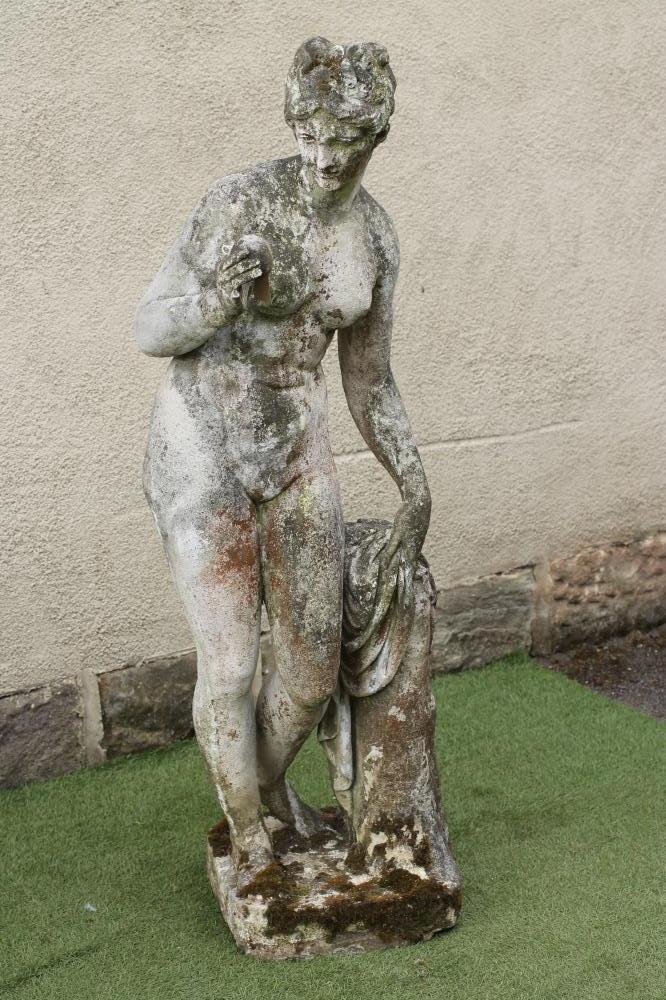 A COMPOSITION STONE FIGURE Image