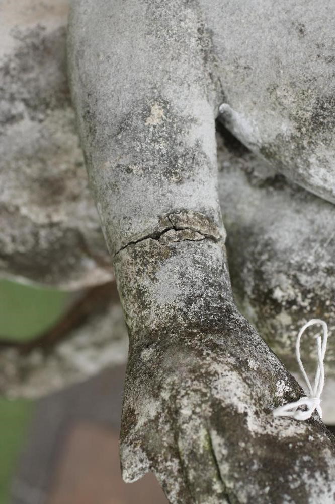 A COMPOSITION STONE FIGURE Image