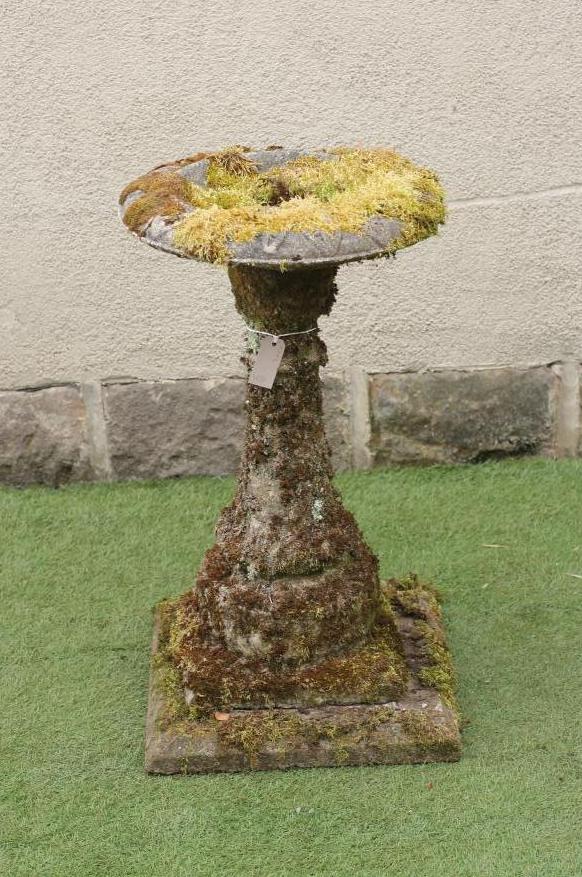 A COMPOSITION STONE BIRD BATH of circular form Image