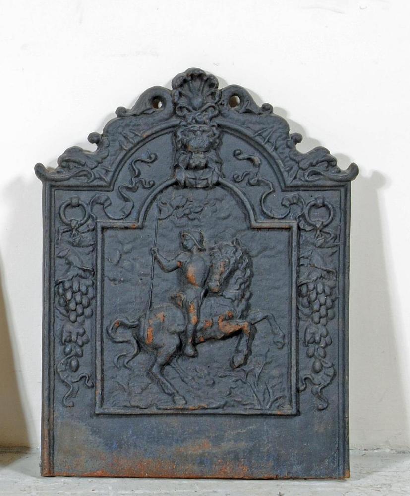 A CAST IRON FIRE BACK of early 18th century design Image