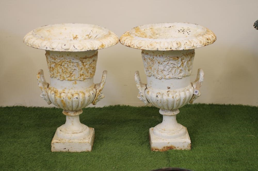 A PAIR OF CAST IRON URNS Image