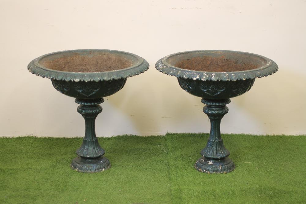 A PAIR OF VICTORIAN CAST IRON URNS Image
