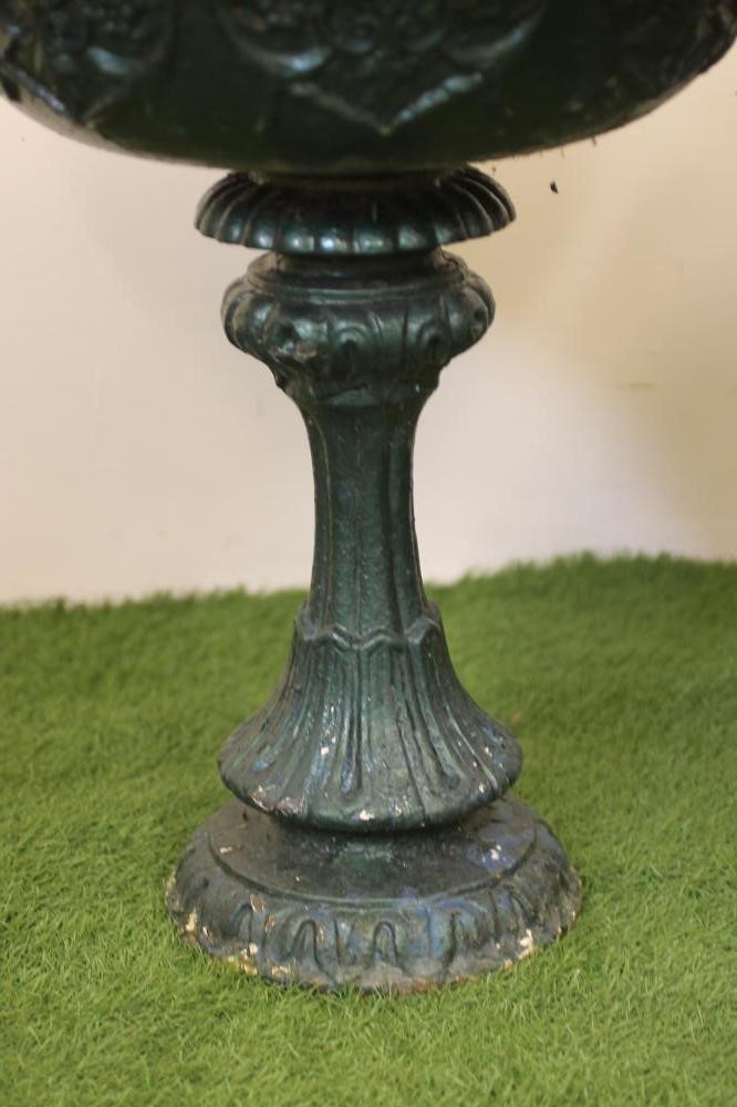 A PAIR OF VICTORIAN CAST IRON URNS Image