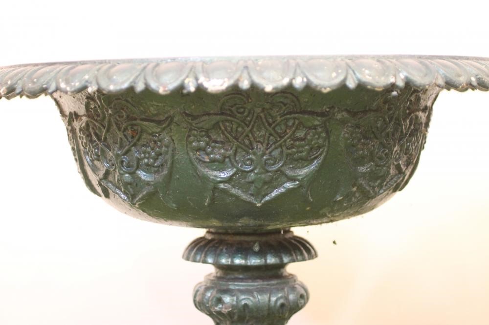 A PAIR OF VICTORIAN CAST IRON URNS Image