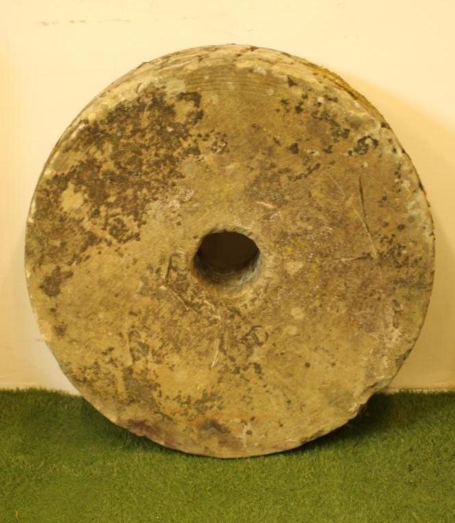 A SANDSTONE MILL STONE Image