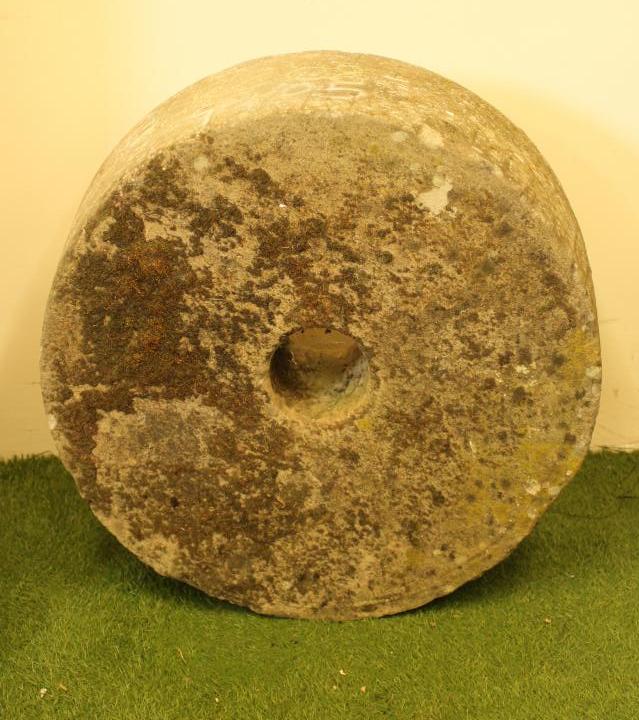 A SANDSTONE MILL STONE to match the previous lot Image
