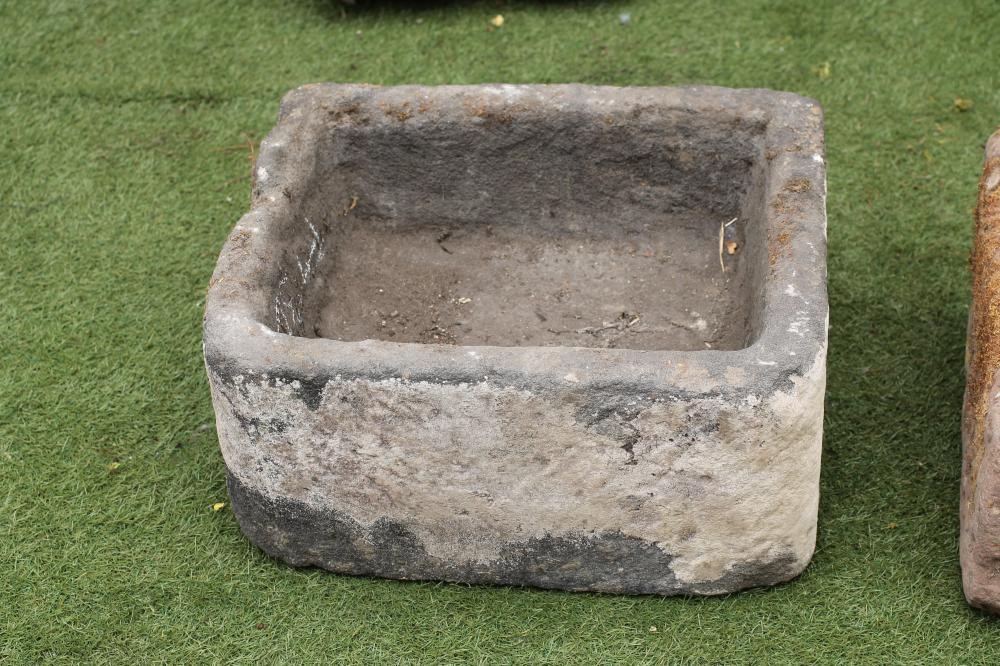 A SMALL SANDSTONE TROUGH of well cut rounded oblong form Image