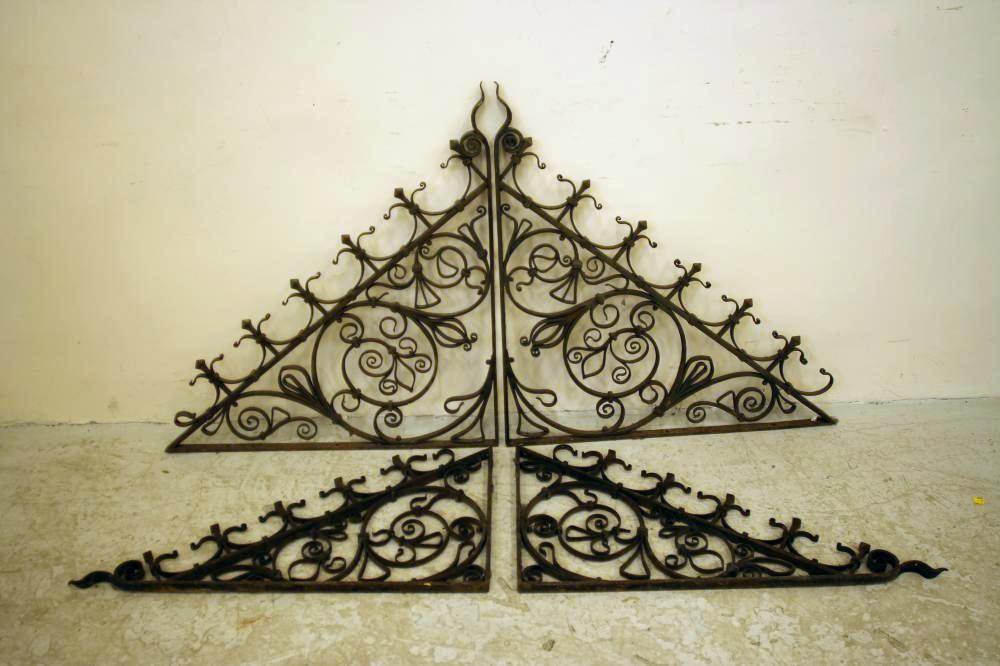 A PAIR OF CAST IRON OPEN SCROLL WORK PANELS Image