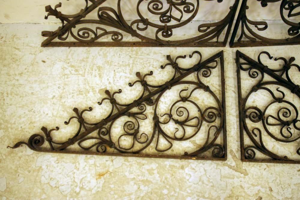 A PAIR OF CAST IRON OPEN SCROLL WORK PANELS Image