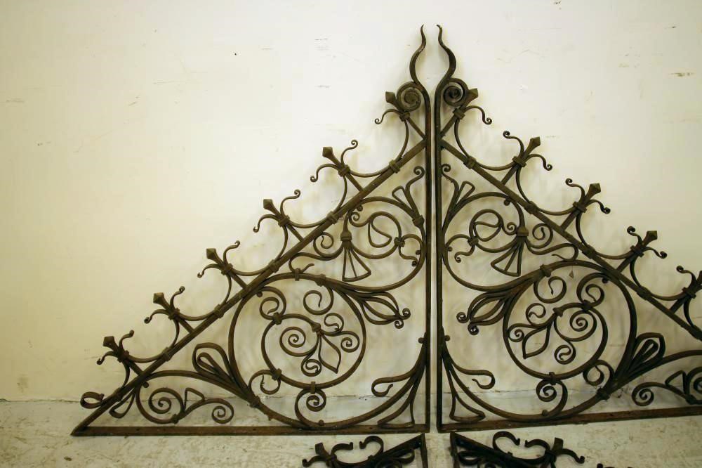 A PAIR OF CAST IRON OPEN SCROLL WORK PANELS Image