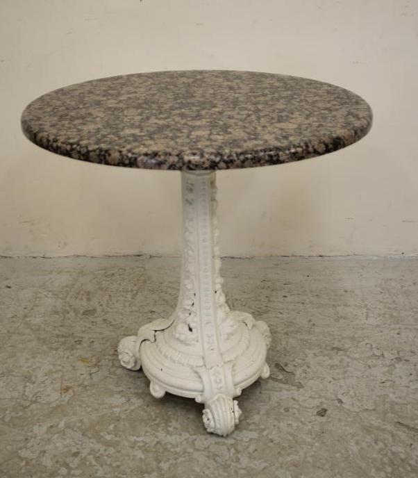 A VICTORIAN CAST IRON GARDEN TABLE Image
