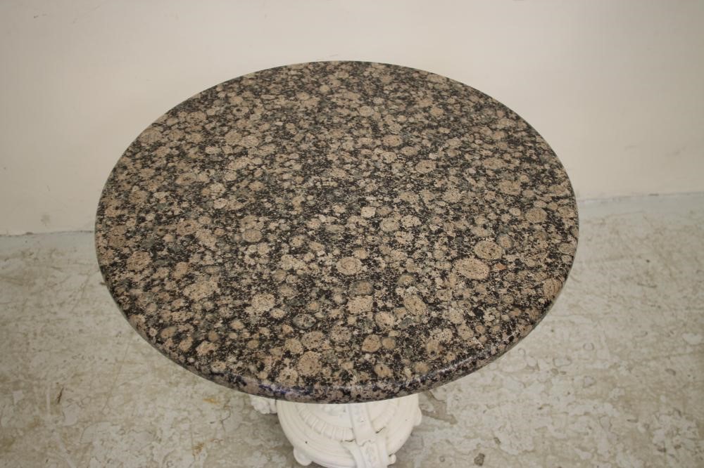 A VICTORIAN CAST IRON GARDEN TABLE Image