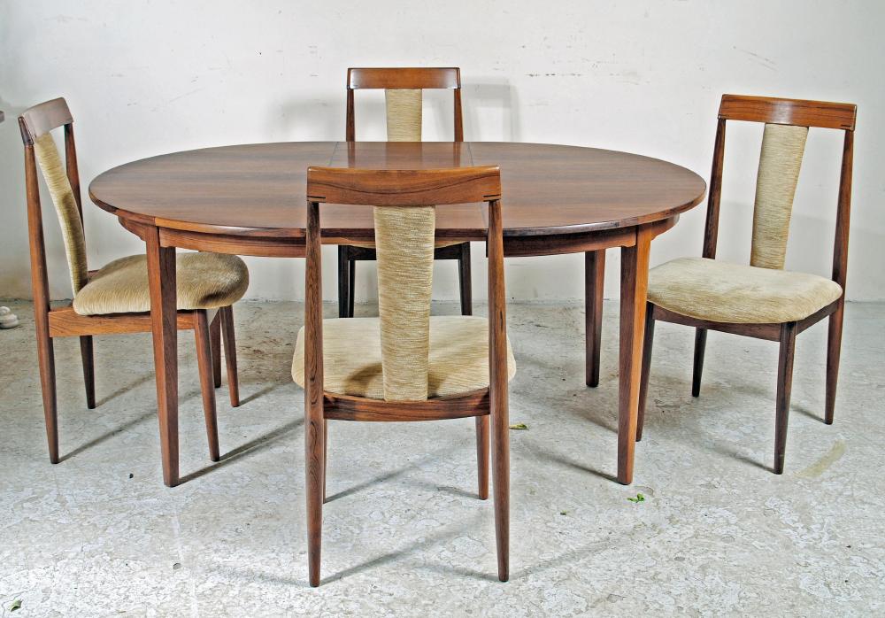 A DANISH ROSEWOOD VENEERED PART DINING SUITE comprising extending D ended table with two separate Image