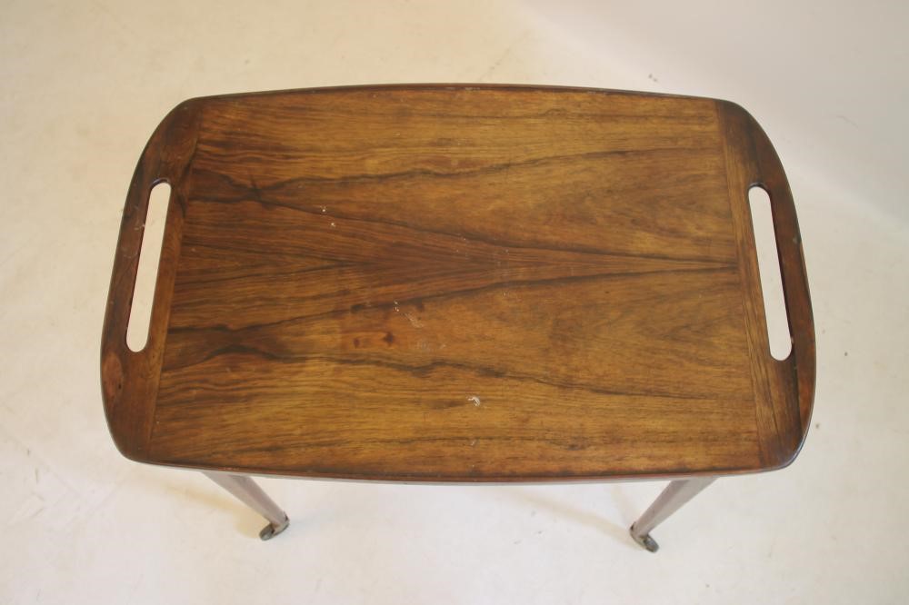 A DANISH ROSEWOOD TROLLEY TABLE Image