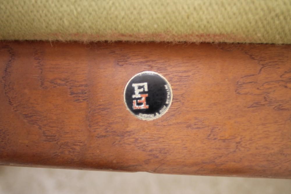 A DANISH TEAK FRAMED THREE SEATER SOFA upholstered in a pale green weave Image