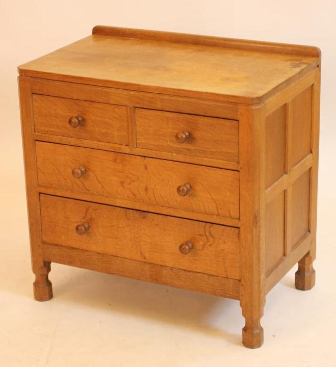 AN ADZED OAK CHEST by Robert Thompson "Mouseman" Image