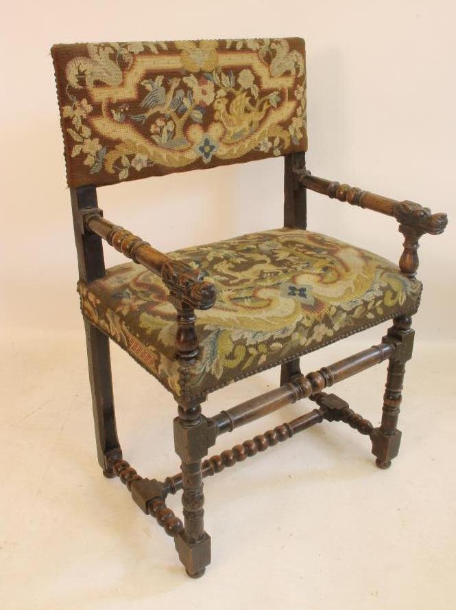 A FLEMISH WALNUT ARMCHAIR Image