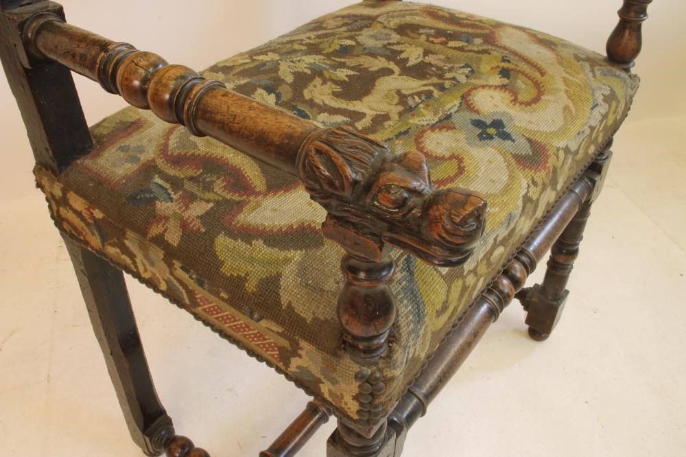 A FLEMISH WALNUT ARMCHAIR Image