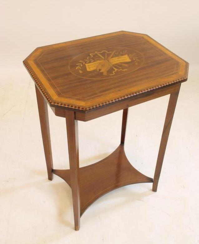 AN EDWARDIAN MAHOGANY AND SATINWOOD BANDED OCCASIONAL TABLE of canted oblong form Image
