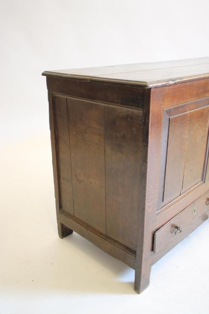 A GEORGIAN OAK PANELLED COFFER Image