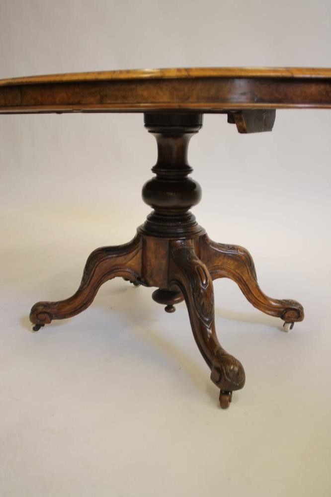 A VICTORIAN WALNUT LOO TABLE Image