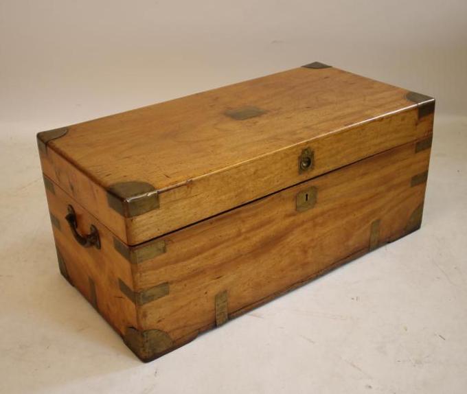 A CHINESE CAMPHOR WOOD AND BRASS MOUNTED TRUNK Image