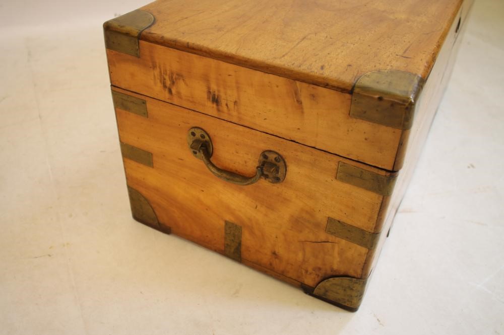 A CHINESE CAMPHOR WOOD AND BRASS MOUNTED TRUNK Image