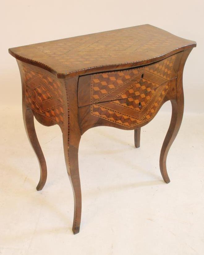 A DUTCH WALNUT AND PARQUETRY COMMODE Image