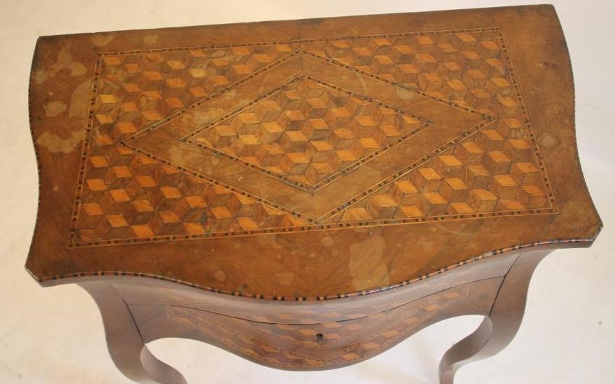 A DUTCH WALNUT AND PARQUETRY COMMODE Image