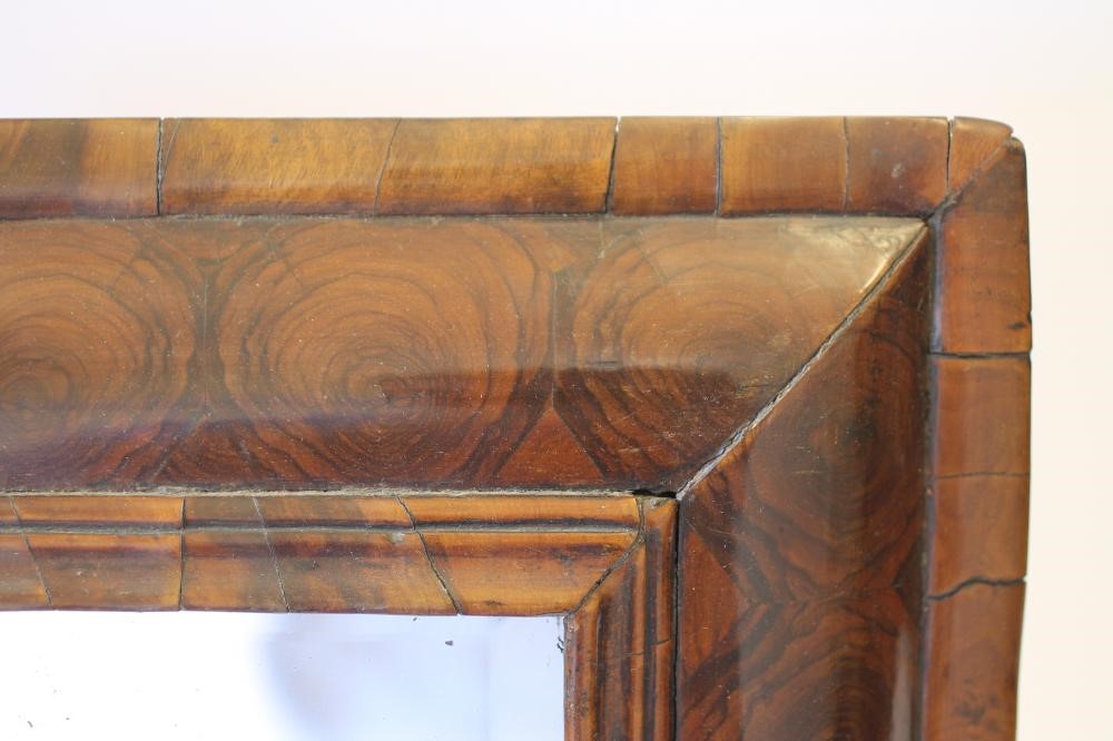 A WILLIAM & MARY WALNUT OYSTER VENEERED SMALL WALL MIRROR Image