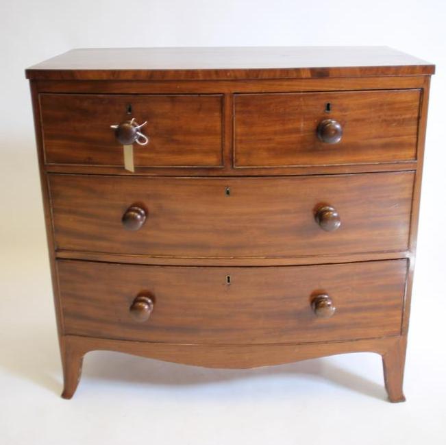 A MAHOGANY CHEST Image