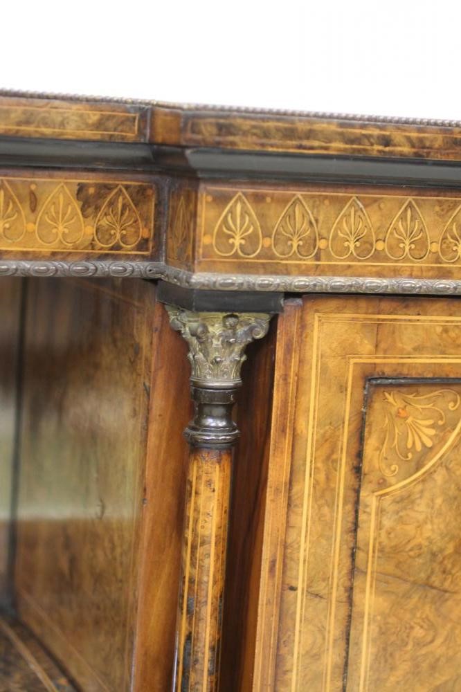 A VICTORIAN WALNUT EBONISED AND MARQUETRY CREDENZA of inverted breakfast form Image
