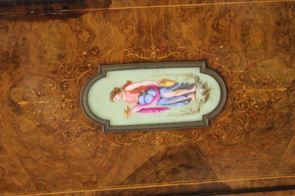 A VICTORIAN WALNUT EBONISED AND MARQUETRY CREDENZA of inverted breakfast form Image