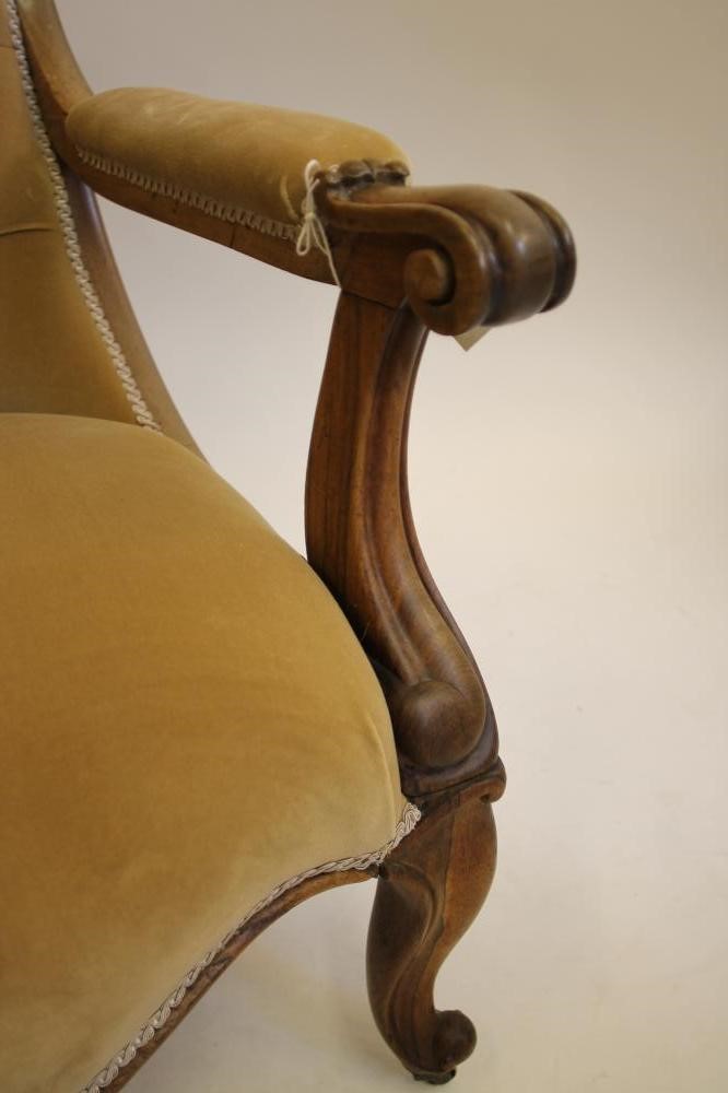 A VICTORIAN WALNUT FRAMED OPEN ARMCHAIR Image