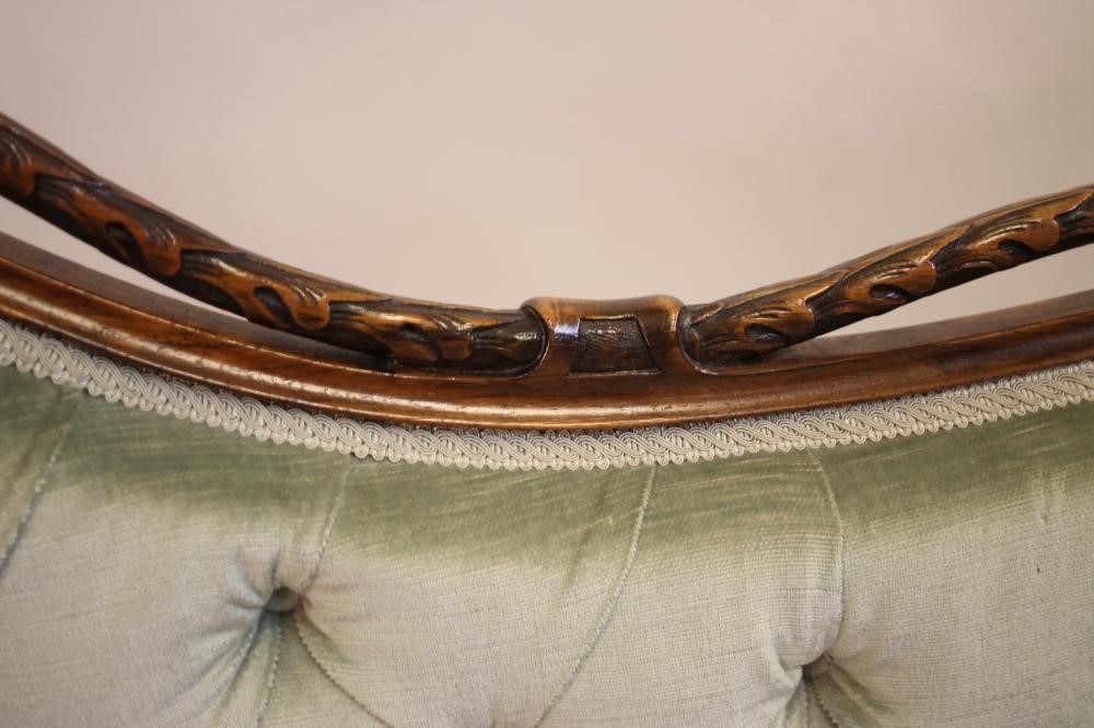 A VICTORIAN WALNUT CHAISE LONGUE of serpentine outline button upholstered in pale green dralon Image