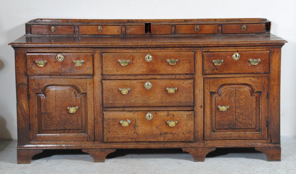 AN OAK ENCLOSED DRESSER Image