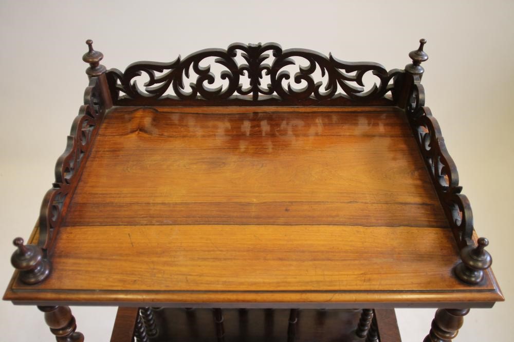 A VICTORIAN ROSEWOOD WHATNOT/CANTERBURY of oblong form Image